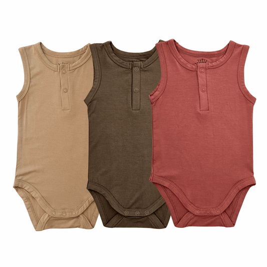 set of three sleeveless bamboo baby bodysuits in mustard, olive green, and dusty red with front button details