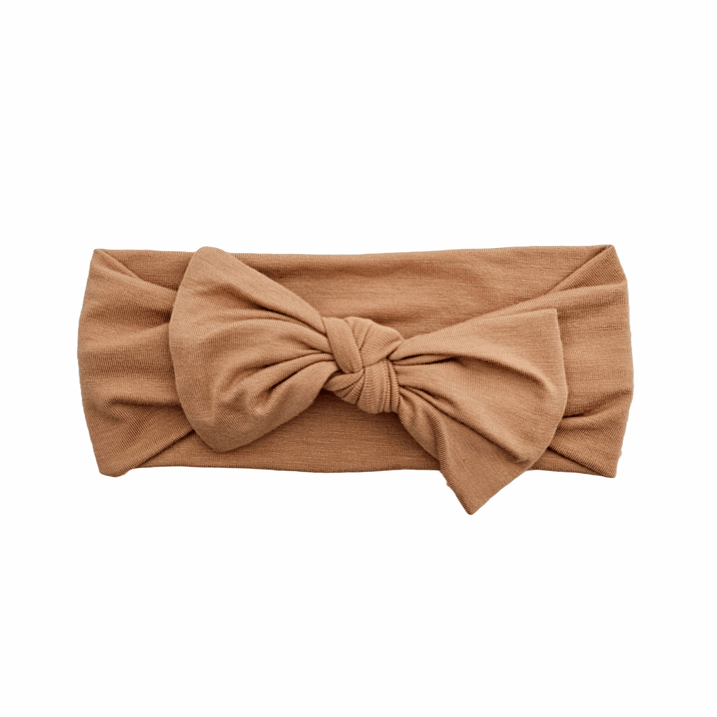 Bamboo baby headband in a warm mustard color by Issy & Lilo, featuring a stylish knotted bow design that is soft, stretchy, and comfortable for infants and toddlers.