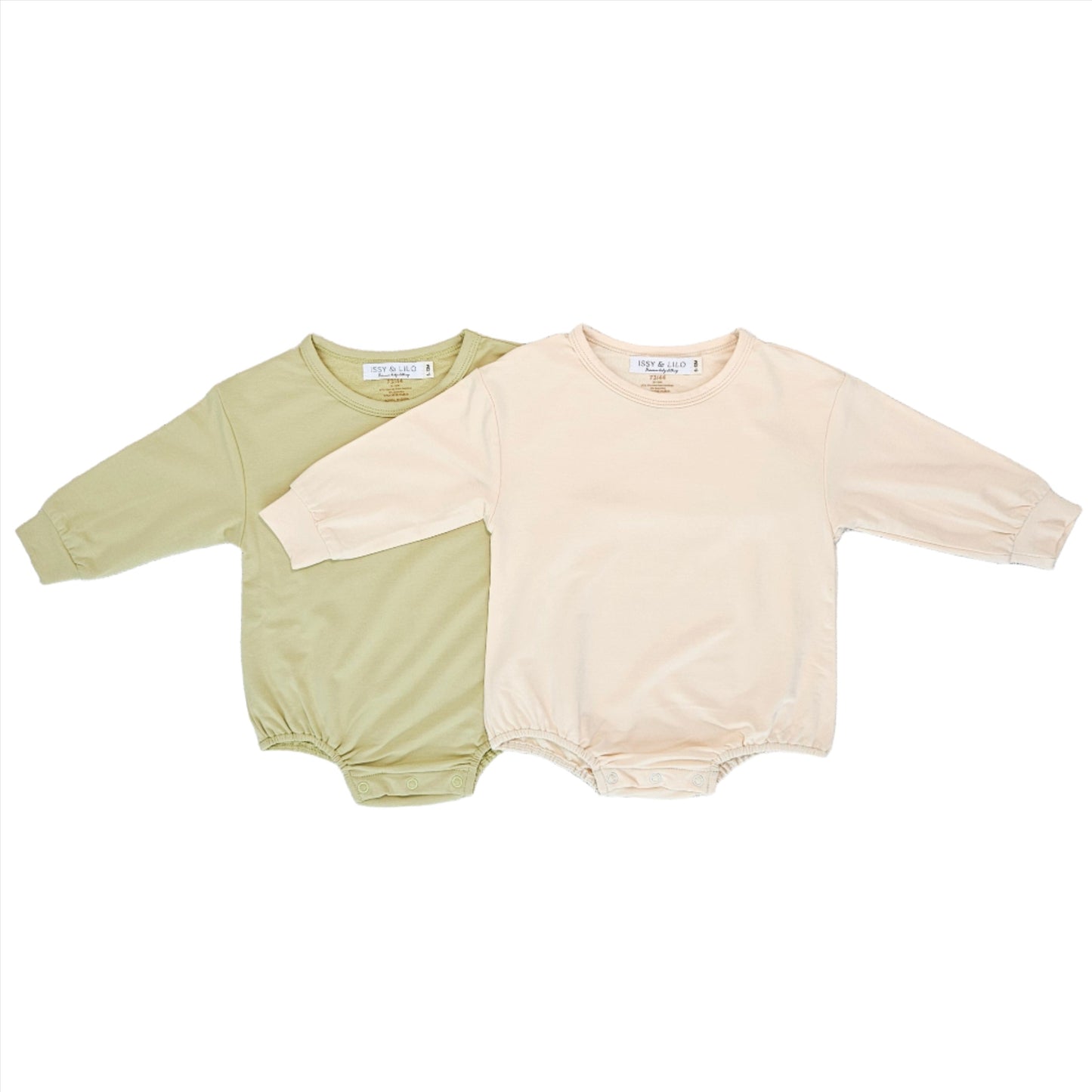 Set of two long-sleeve baby bodysuits in soft bamboo fabric by Issy & Lilo, featuring earthy tones in cream and sage green. Comfortable and breathable design with snap closures for easy diaper changes.