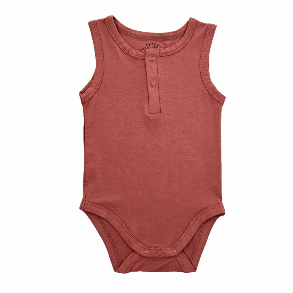sleeveless bamboo romper in red with snap closures