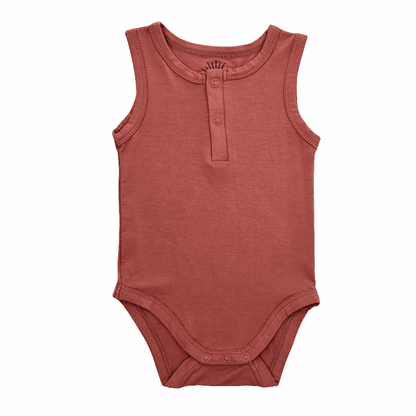sleeveless bamboo romper in red with snap closures