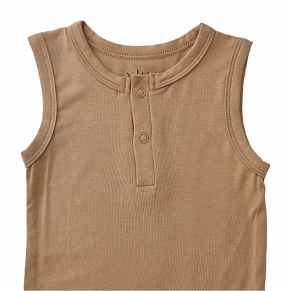 sleeveless bamboo baby bodysuit in mustard with front button details